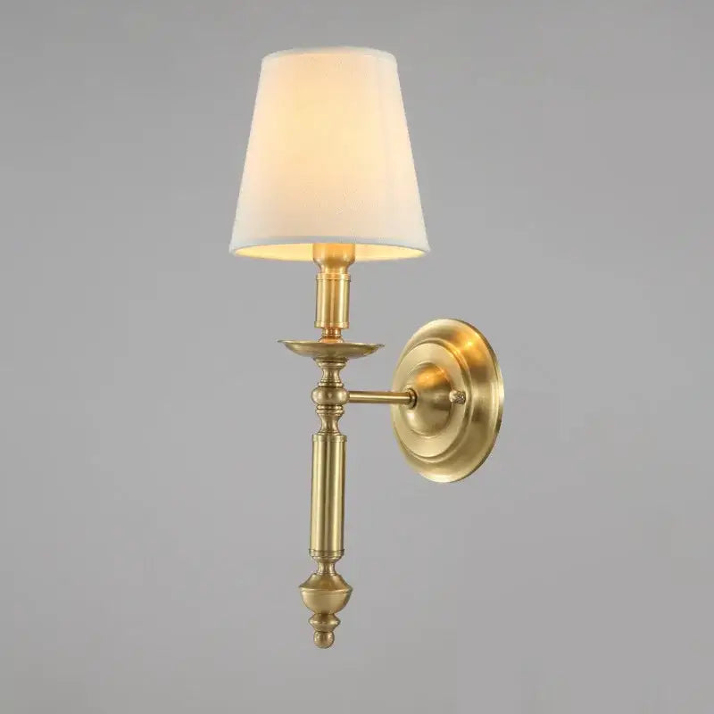 Brass wall sconce with cream fabric shade complementing decorbites copper ceiling chandelier for living room lighting