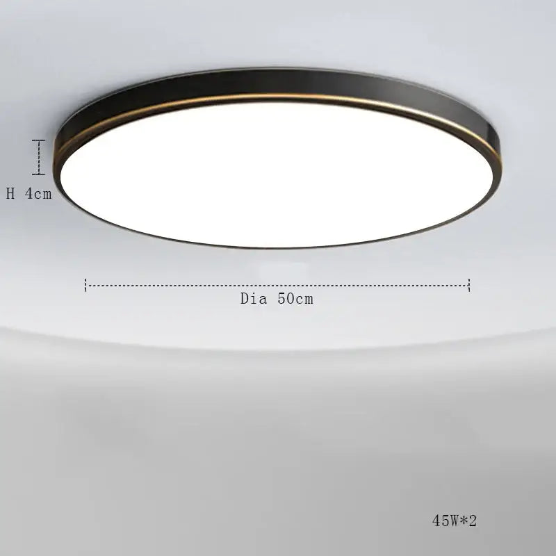 Circular ceiling lamp with sleek black frame, thin gold trim, and bright white diffused surface for modern copper ceiling use
