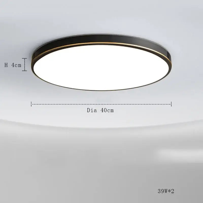 Modern brushed brass copper ceiling lamp with frosted glass and sleek black frame with gold trim emitting bright light