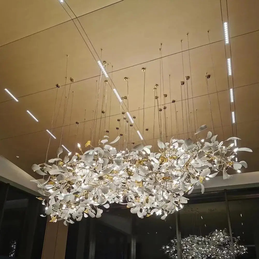 White ginkgo leaf chandelier lantern with delicate white leaves and golden accents for luxury dining room lighting