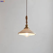 Cream-colored vintage ceramic led pendant lamp with wooden handle brass hardware and ribbed glass shade for kitchen use