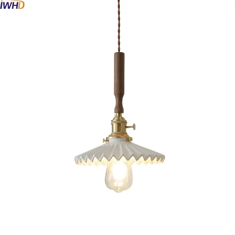 Vintage brass and ceramic led pendant light with warm brass fixture wooden handle and off-white scalloped glass shade