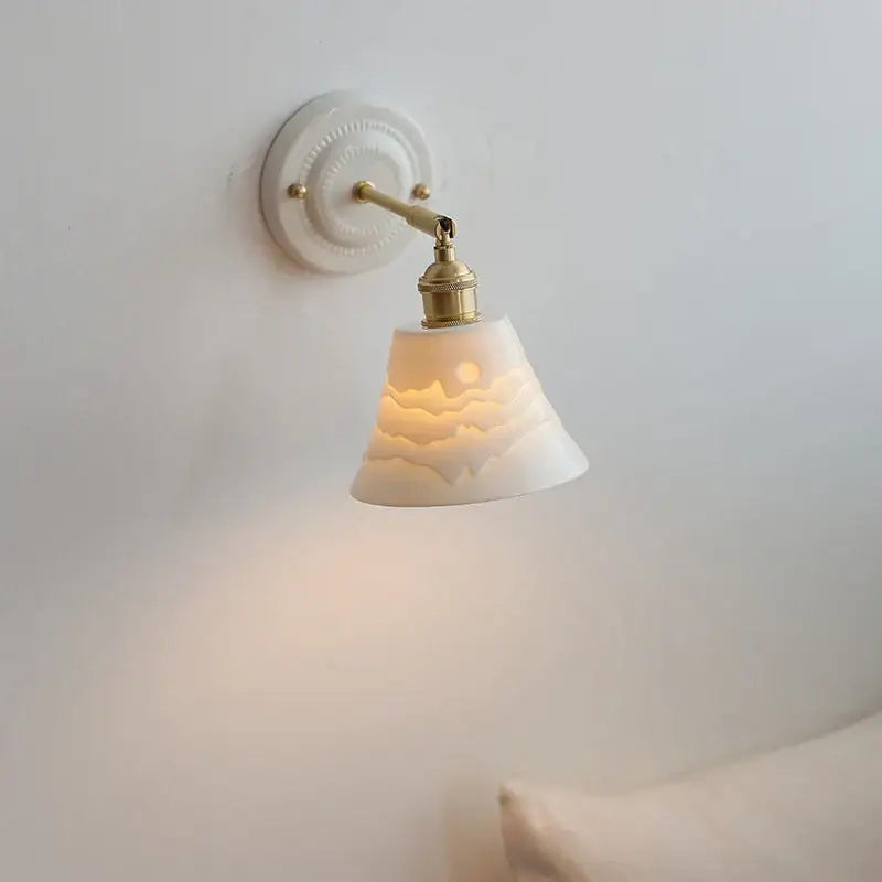 White and gold copper ceramic led wall lamp with etched landscape shade and brass arm for living room lighting