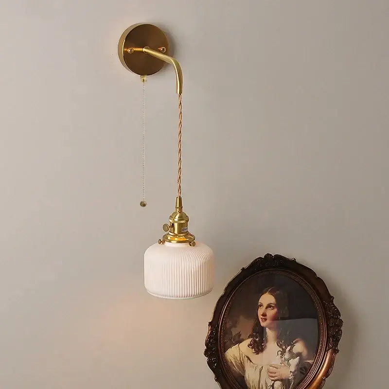 Modern copper ceramic led wall light with a vintage brass sconce and ribbed white glass shade by decorbites copper ceramic
