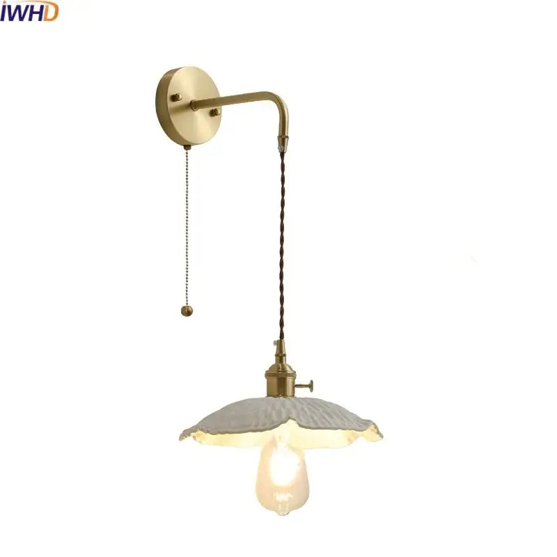 Vintage brass and ceramic led wall light bedroom sconce with textured off-white glass shade and twisted cord