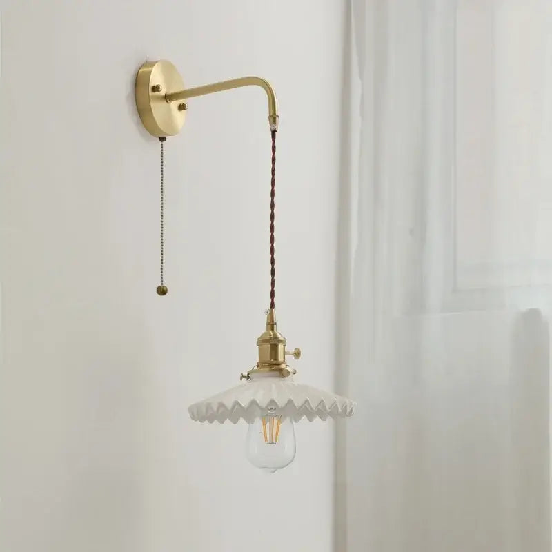 Vintage brass wall light with ceramic led scalloped glass shade and dark braided cord for bedroom sconce lighting