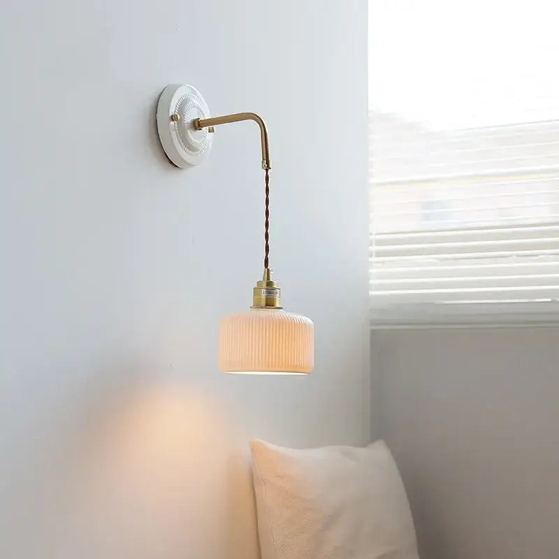Vintage brass ceramic led wall light with ribbed off-white glass shade and twisted cord for living room lighting
