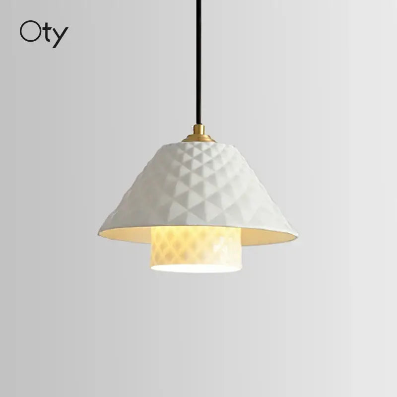 Textured white ceramic pendant light with gold metal fixture and black cord for kitchen dining room ceramic pendant lights