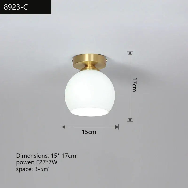 A modern decorbites copper chandelier with a gold-toned metal base and frosted white glass globe ceiling light