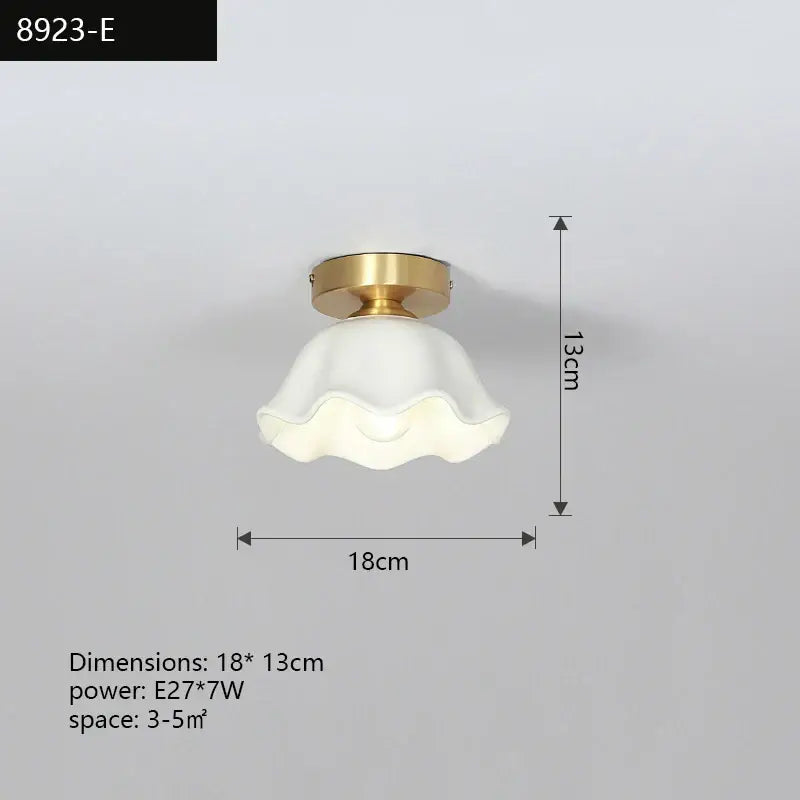 Modern decorbites copper chandelier with a delicate white glass lampshade featuring a scalloped edge and gold-toned base