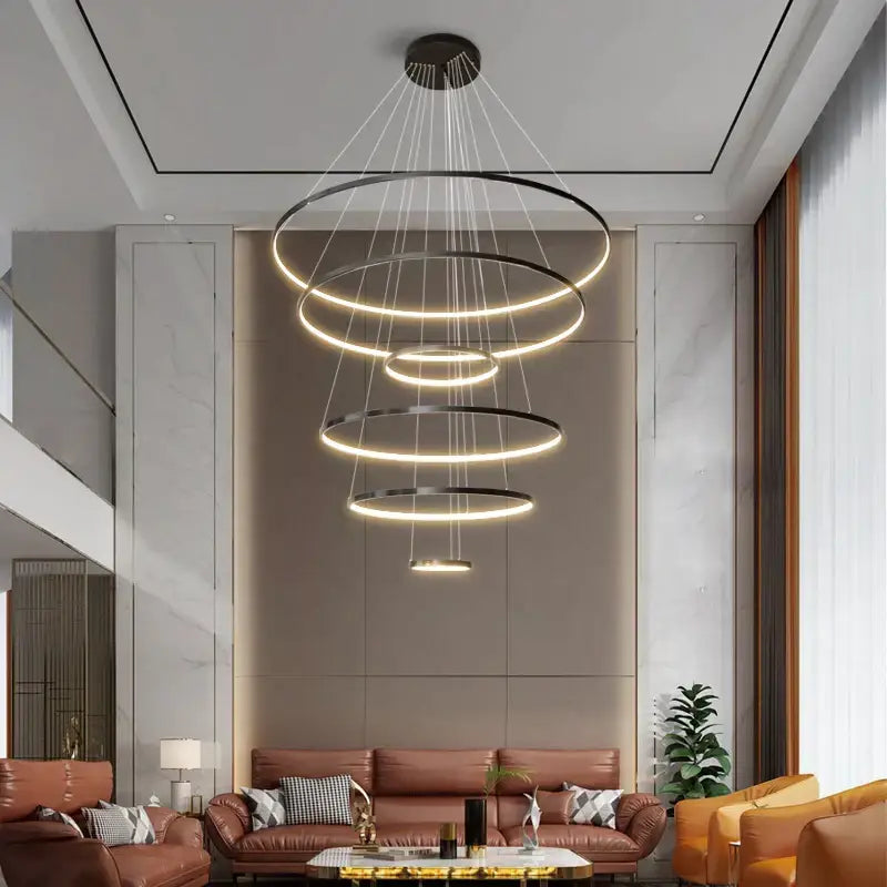 Modern decorbites copper circle chandelier with tiered black rings and warm led light for living room decor