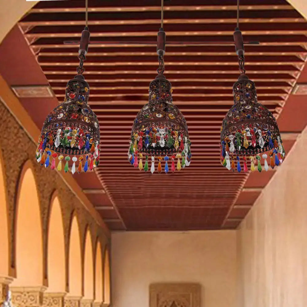 Three dark metal art deco copper cluster pendant ceiling lights with colorful glass beads and tassels for corridors