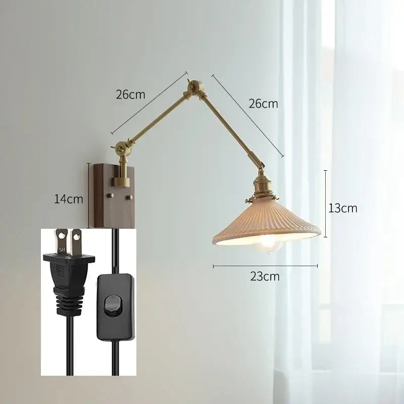 Brass-finished decorbites copper swing arm wall lamp with adjustable arm and ribbed off-white glass shade for bedroom