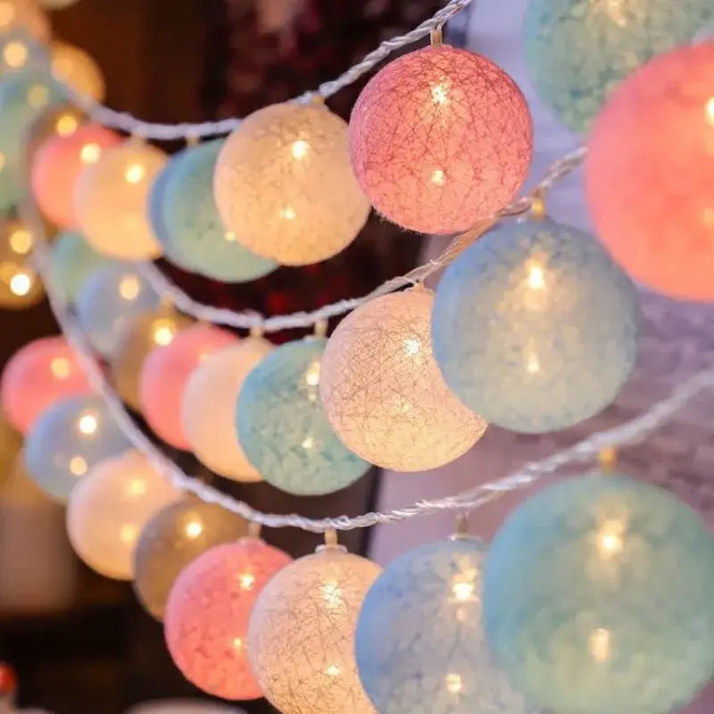 Pastel-colored DecorBites™ cotton garland led string lights with crackled textured spherical cotton garland bulbs