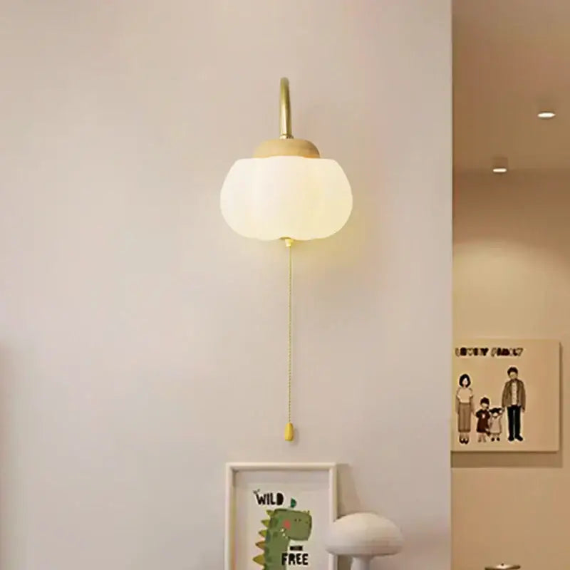 Copper-toned decorbites cotton led wall lamp with frosted glass globe and wooden accent for bedroom sconce lighting