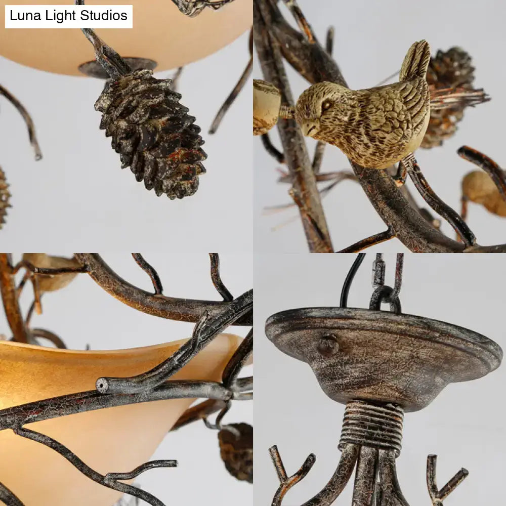 Rustic bronze metal decorbites™ country bronze 3-light bowl semi flush chandelier with hand-painted bird accents and amber glass shades