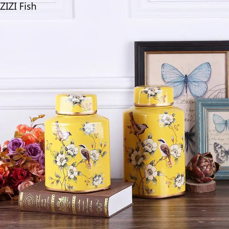 Vibrant yellow decorbites country ceramic canisters with gold trim and white floral bird motifs for dining room decor