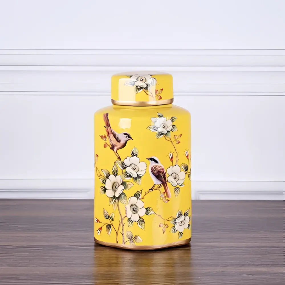 A decorbites country ceramic yellow floral jar with delicate white flowers and birds for dining room decor