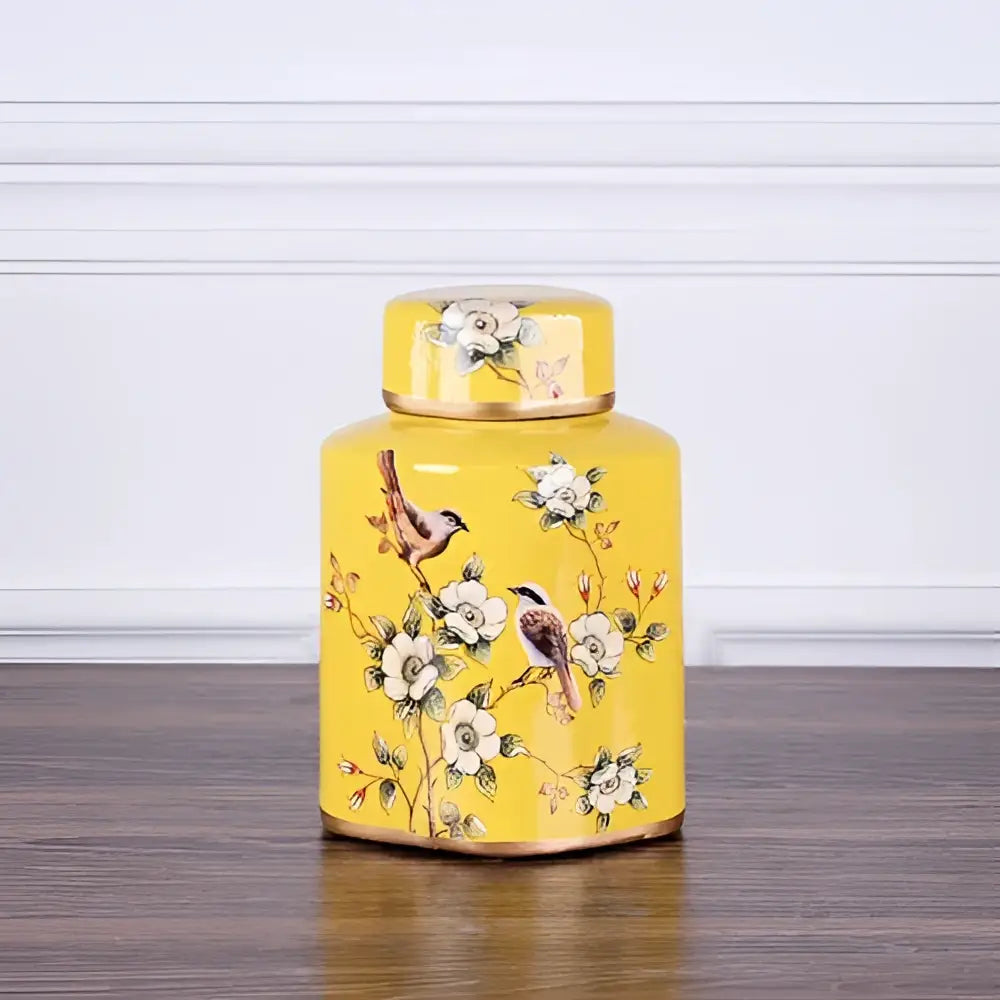 Bright yellow decorbites country ceramic tea canister with white floral bird motifs and gold trim for dining room decor