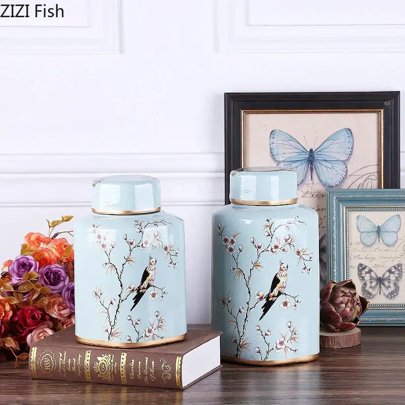 Light blue decorbites country ceramic canisters with gold trim and hand-painted cherry blossom design for dining decor