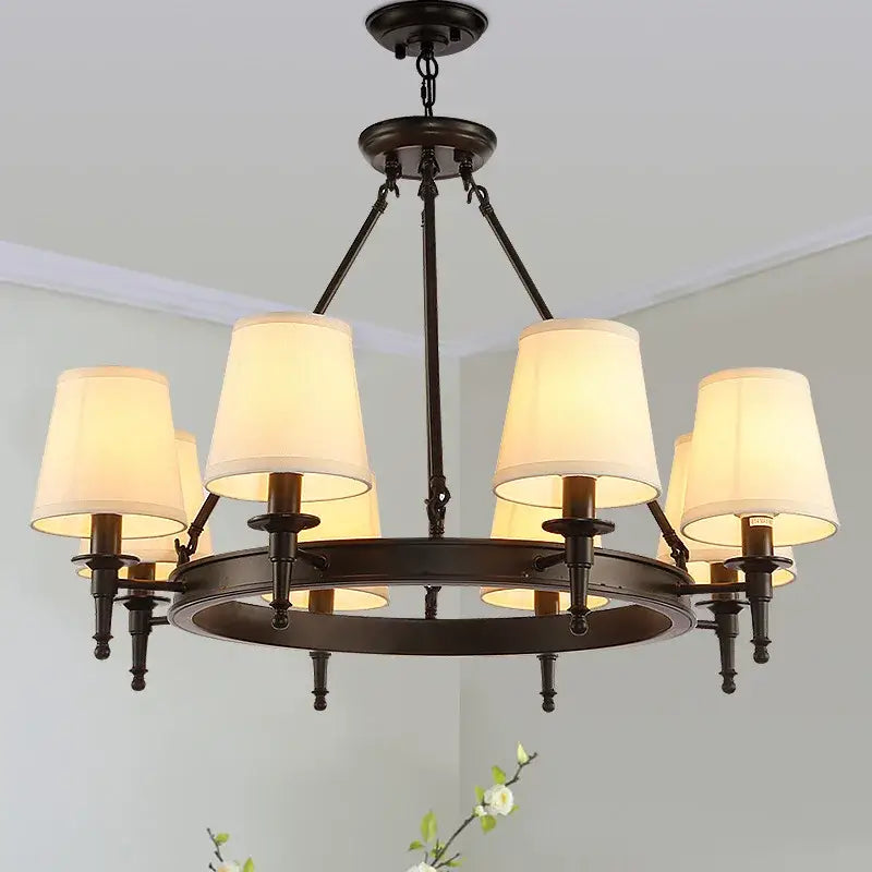 Dark bronze-finished decorbites country fabric chandelier with six cream fabric shades for bedroom lighting