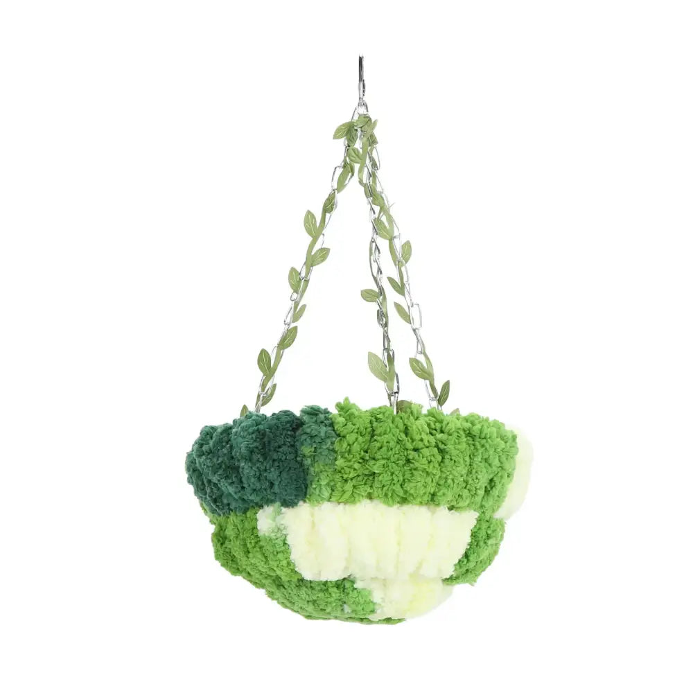 Green and cream parrot hammock bed with coral fleece plush and leaf-adorned metal chain for hanging