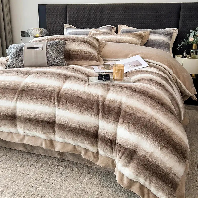 Faux fur comforter with horizontal beige, brown, and cream stripes from decorbites cozy faux gray and white bedding set