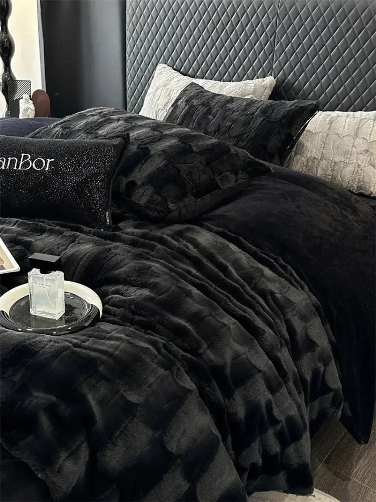 Black plush decorbites cozy faux rabbit fur bedding set with velvety texture and shimmering accents for bedroom use