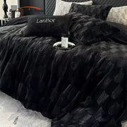 Black plush quilt bedding set with decorbites cozy faux rabbit fur fabric and lanbor logo pillow in black and grey bedroom