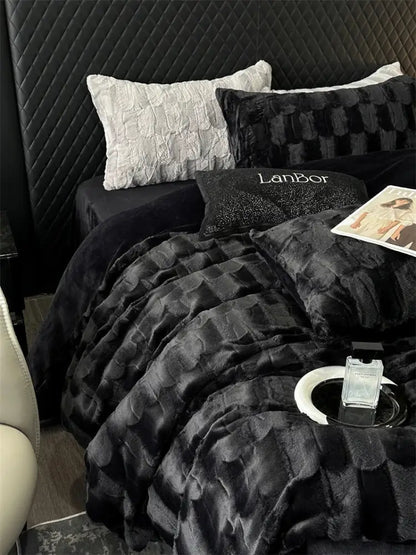 Black plush quilt with textured scalloped pattern from decorbites cozy faux rabbit fur bedding set in black and grey