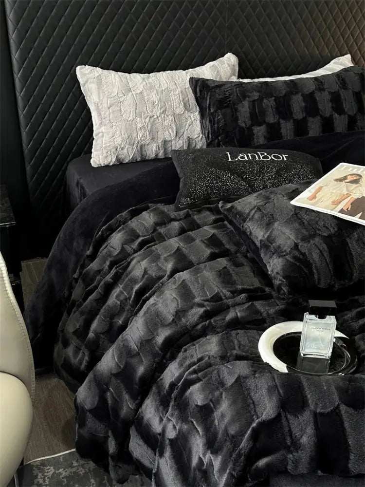 Black plush quilt with textured scalloped pattern from decorbites cozy faux rabbit fur bedding set in black and grey