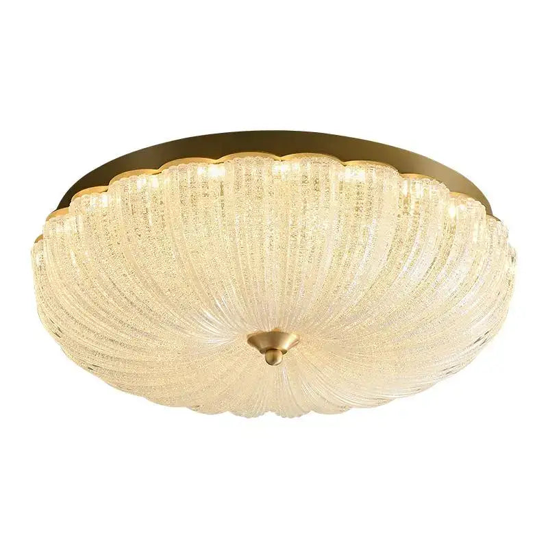 Decorbites cream air ceiling lamp with warm ribbed cream glass and gold metal accents for bedroom lighting