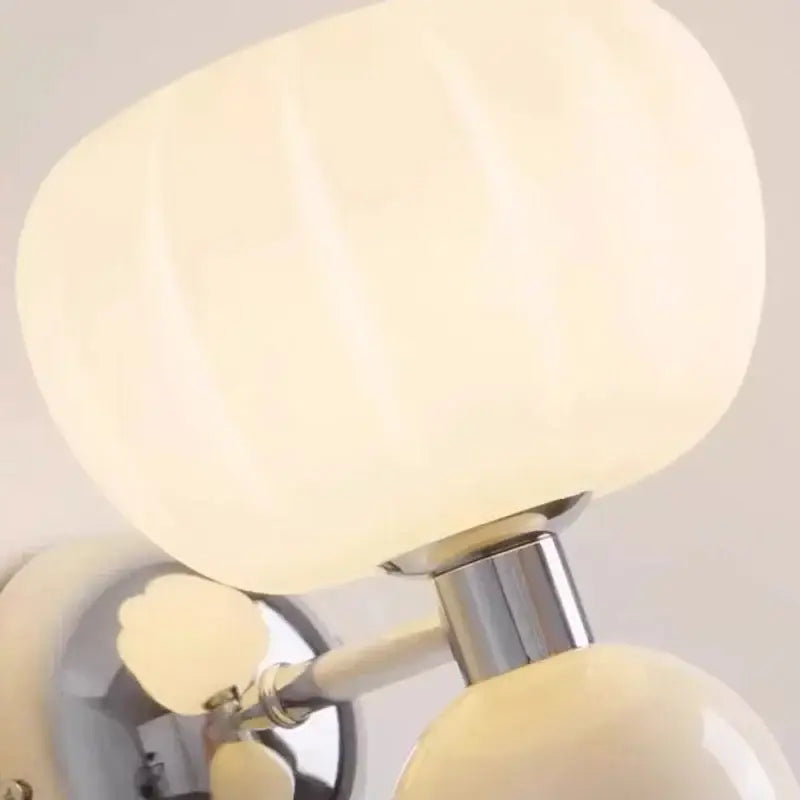 Decorbites cream breeze frosted glass pumpkin wall sconce with cream ribbed glass lampshade and chrome base