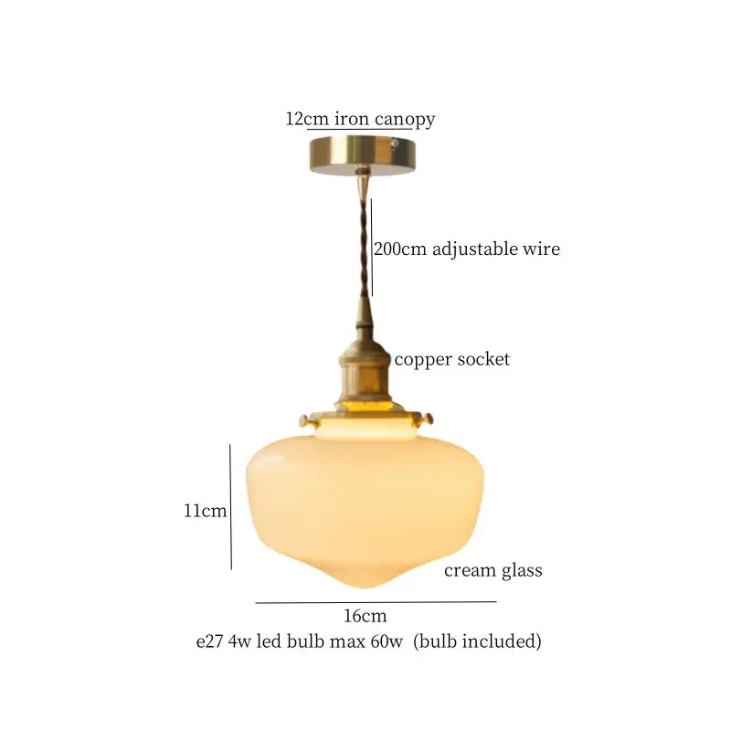 Vintage-style pendant light with brass iron canopy, adjustable copper wire, and cream glass shade by Decorbites