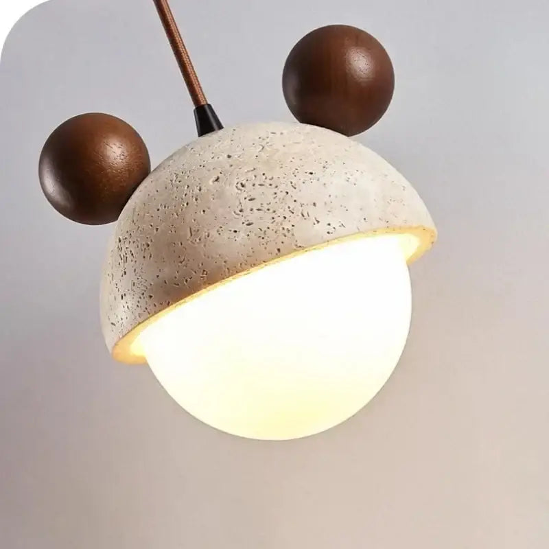 Decorbites cream glass led pendant light with speckled concrete dome, wood ears, and glowing glass globe for bedroom