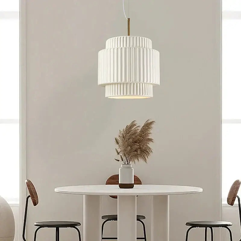 Decorbites cream wind led chandelier featuring a cream tiered pendant light with vertical fluted design and gold rod