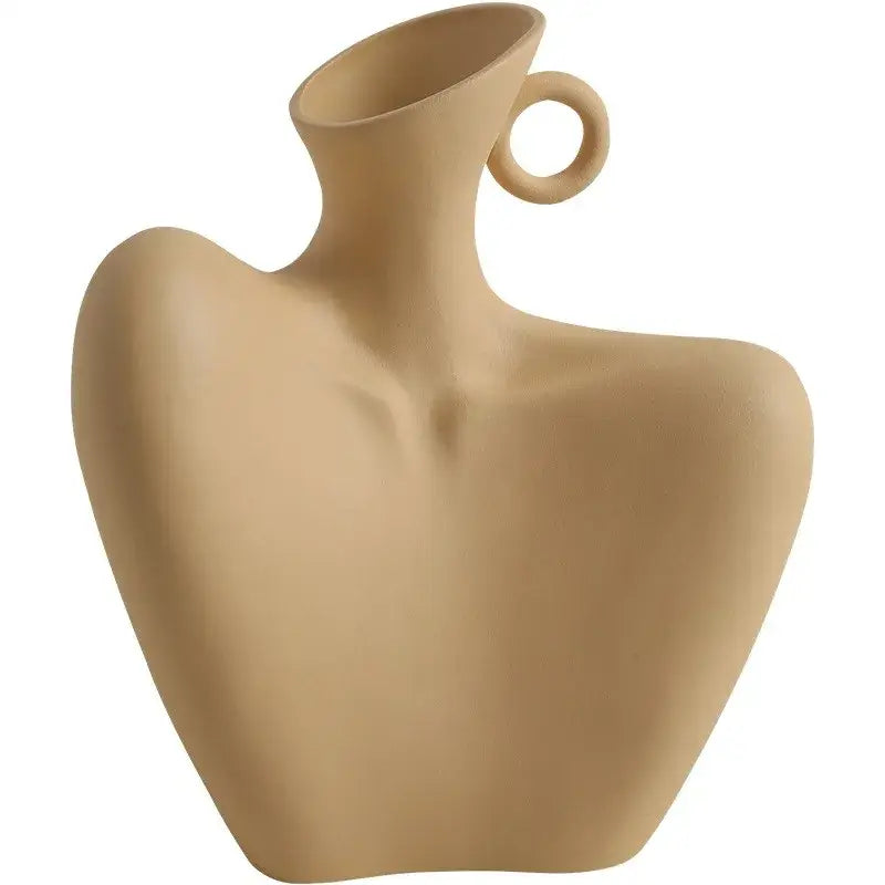 Beige ceramic human vase with sculpted abstract torso shape and circular handle for creative home decor by DecorBites