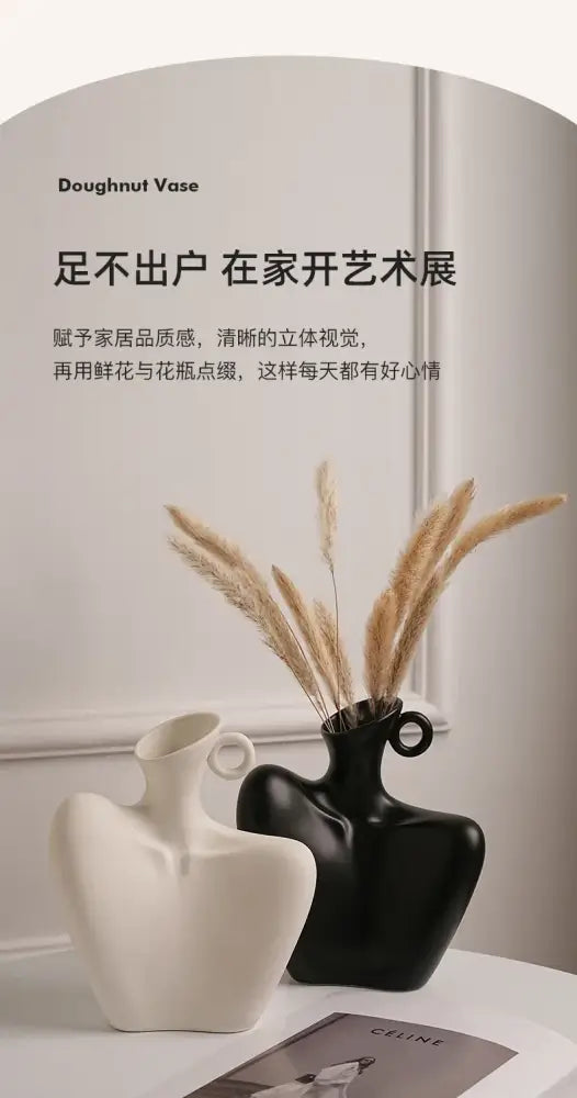 Cream-colored ceramic human vase with sculpted organic form and circular handle for stylish home decor by DecorBites™