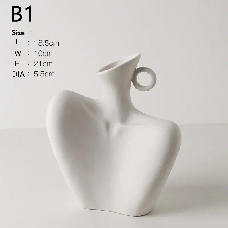 A sleek white ceramic human vase with sculpted torso and circular handle for modern home decor by DecorBites™