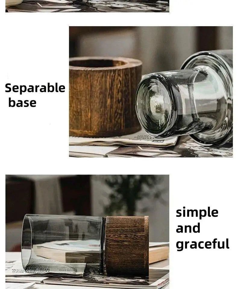 A DecorBites™ creative retro glass vase with a clear glass tumbler and dark wood base for living room decor