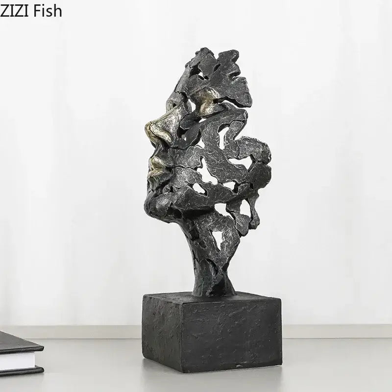 Abstract black and silver metallic decorbites creative thinker modern sculpture with organic flowing forms on a square base