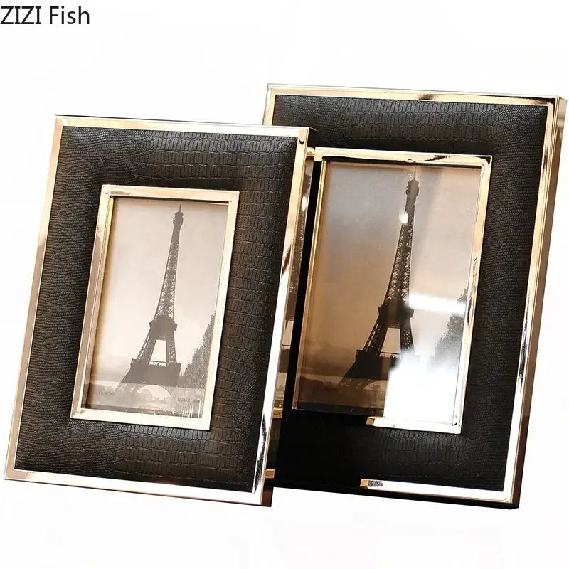Elegant black decorbites crocodile leather modern photo frame with gold edges holding sepia eiffel tower images