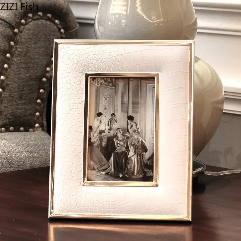 Cream-colored decorbites crocodile leather modern photo frame with gold-toned inner border for living room decor