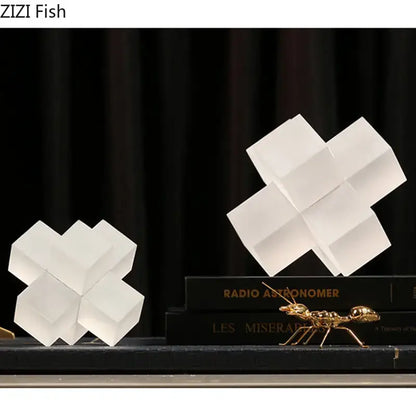 White geometric cube sculptures with translucent frosted finish in decorbites cross crystal black geometric interlocking sculpture