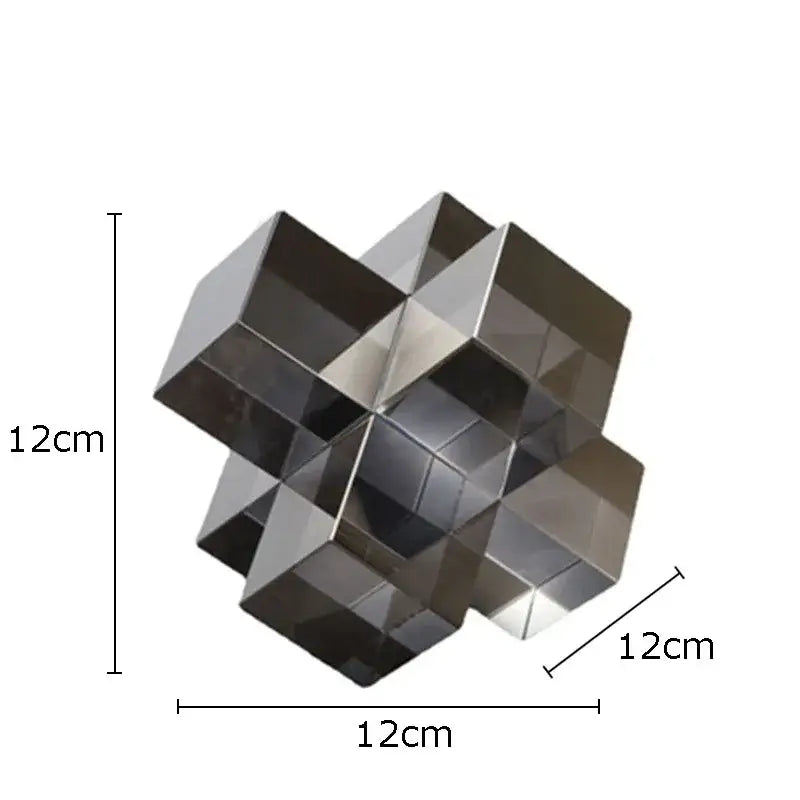 A sleek 12cm cube metallic decorbites cross crystal sculpture with reflective silver finish for living room decor