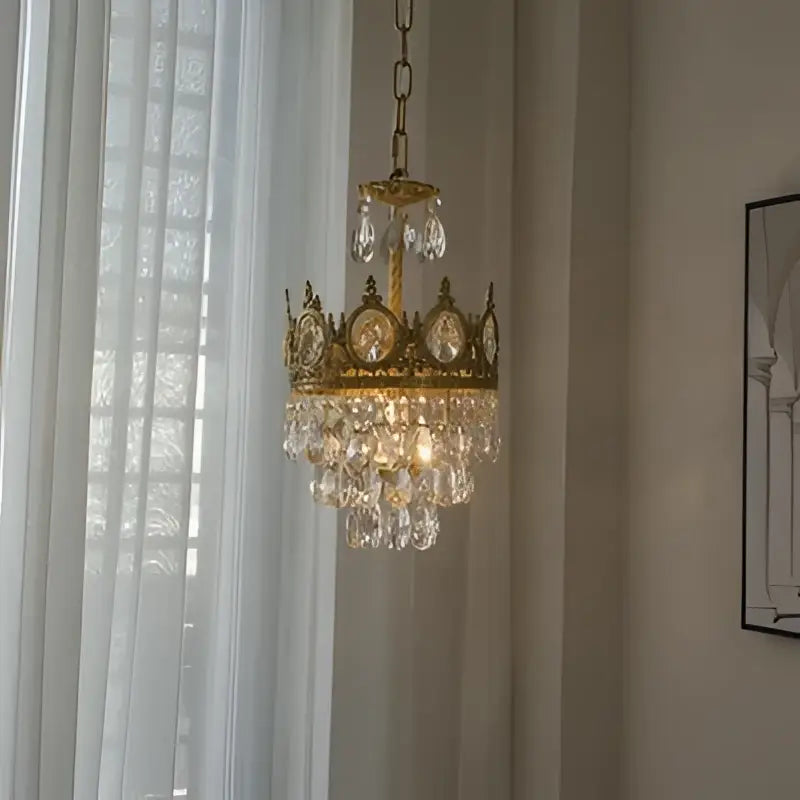 Golden crown crystal chandelier with dangling crystal droplets by decorbites crown crystal for bedroom pendant light