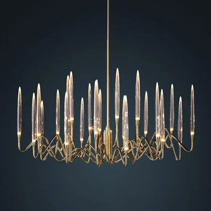 Gold-toned decorbites crystal branch chandelier with slender glass arms and intricate metalwork for dining room lighting