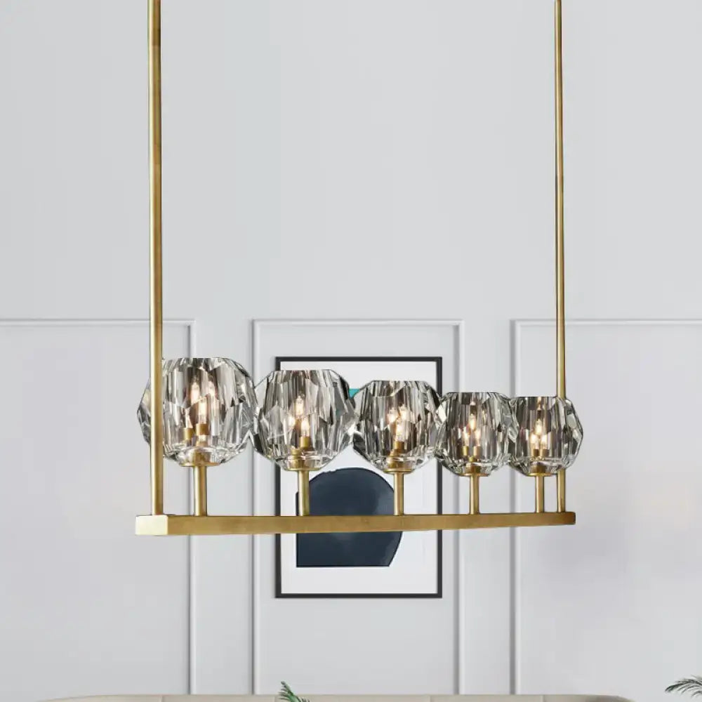 DecorBites crystal brass island ceiling suspension lamp with five faceted crystal globe shades and slender rods
