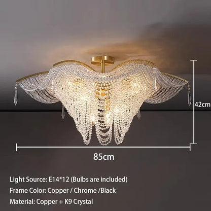A decorbites crystal butterfly gold tassel chandelier with a golden copper frame and cascading k9 crystals for living room light