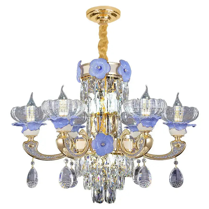 Elegant decorbites crystal candle chandelier in gold with clear crystal droplets and blue floral accents for living room light